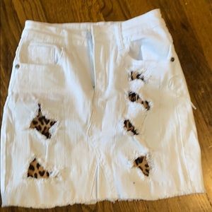 White jean skirt with cheetah print